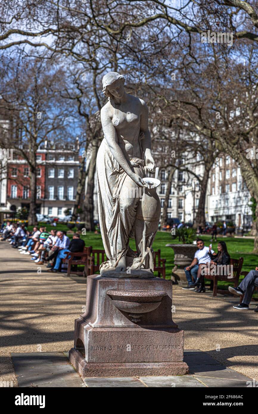 Nymph statue by Alexander Munro on the Lansdowne Drinking Fountain, Berkeley Square, Mayfair, London, England, UK. Stock Photo