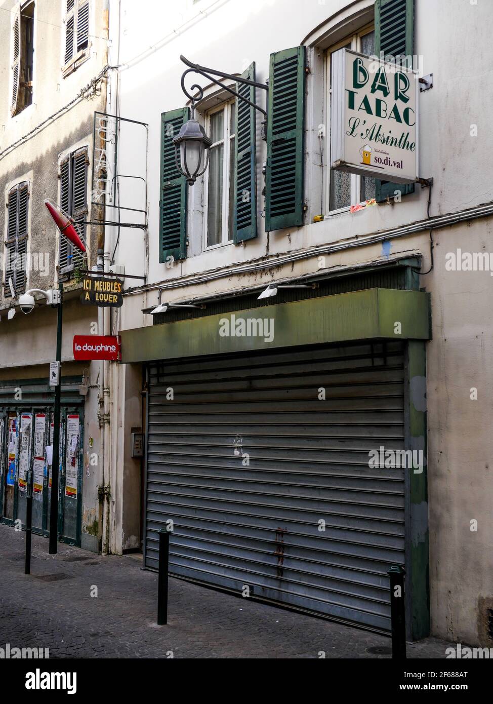 Commercial Signs and Video Surveillance topping a closed shop, Montélimar,  Drome, France Stock Photo - Alamy