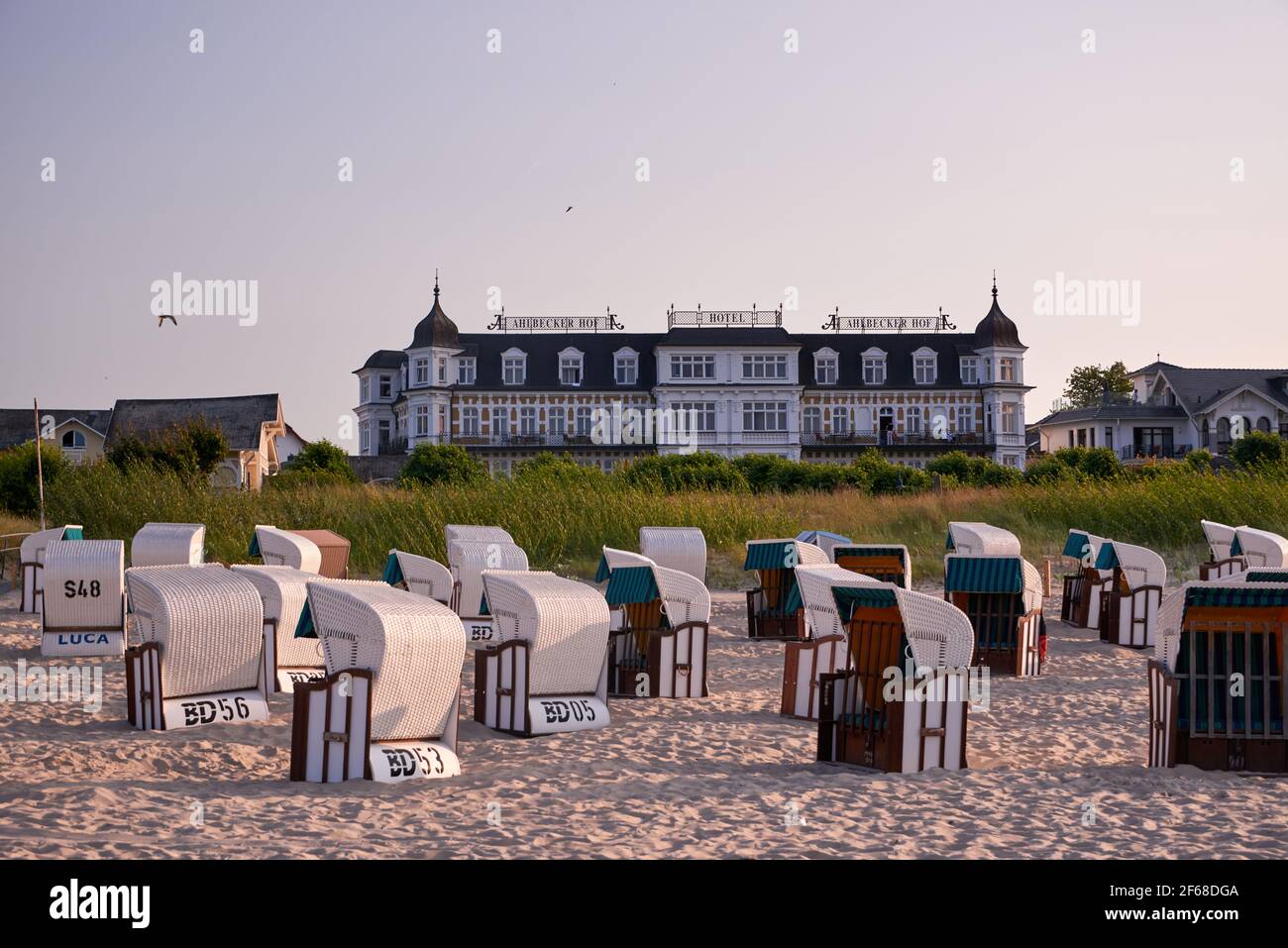 View of Hotel Ahlbecker Hof from the beach with beach chairs Stock Photo