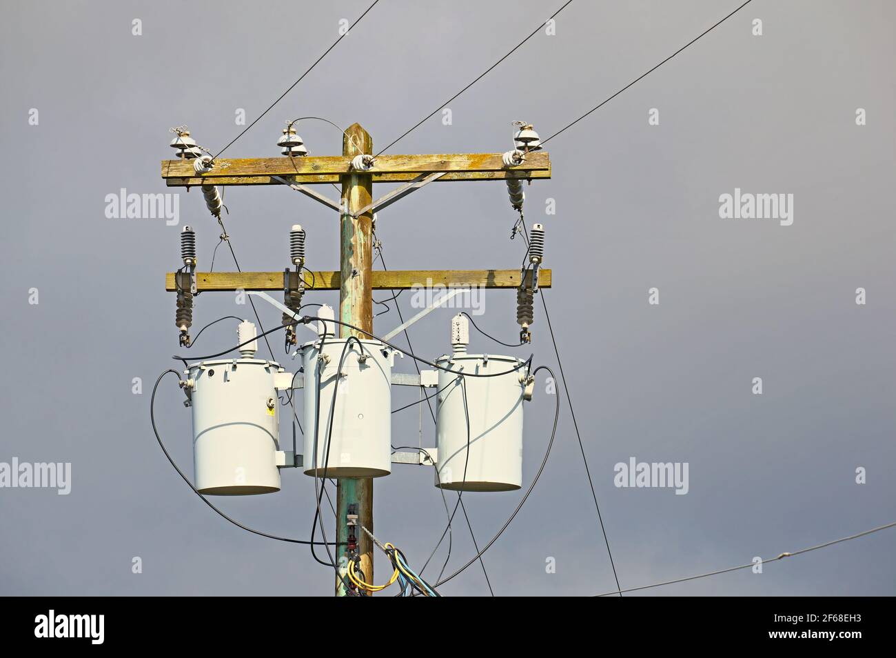 Power lines and transformers against a stormy sky.  Stock photo. Stock Photo