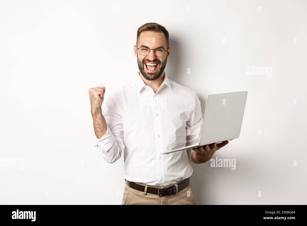 Happy Program Manager Business. Happy manager winning online, rejoicing with fist pump ...