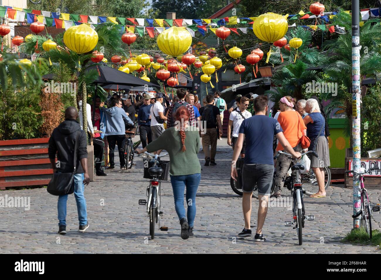 Freetown Christiania. Pusher Street is the main street of drug dealers, where drugs are sold quite openly at stalls Stock Photo