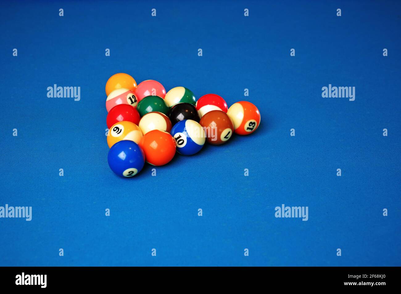 billiard balls on a blue background Stock Photo