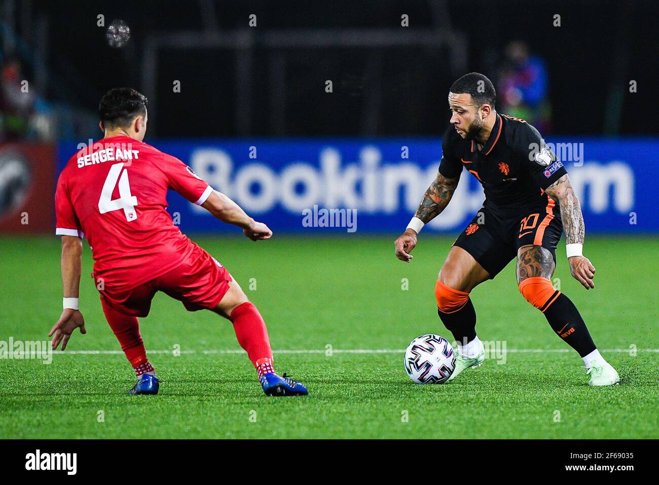 GIBRALTAR, GIBRALTAR - MARCH 30: Jack Sergeant of Gibraltar, Memphis Depay of the Netherlands during the FIFA World Cup 2022 Qatar Qualifier match bet Stock Photo
