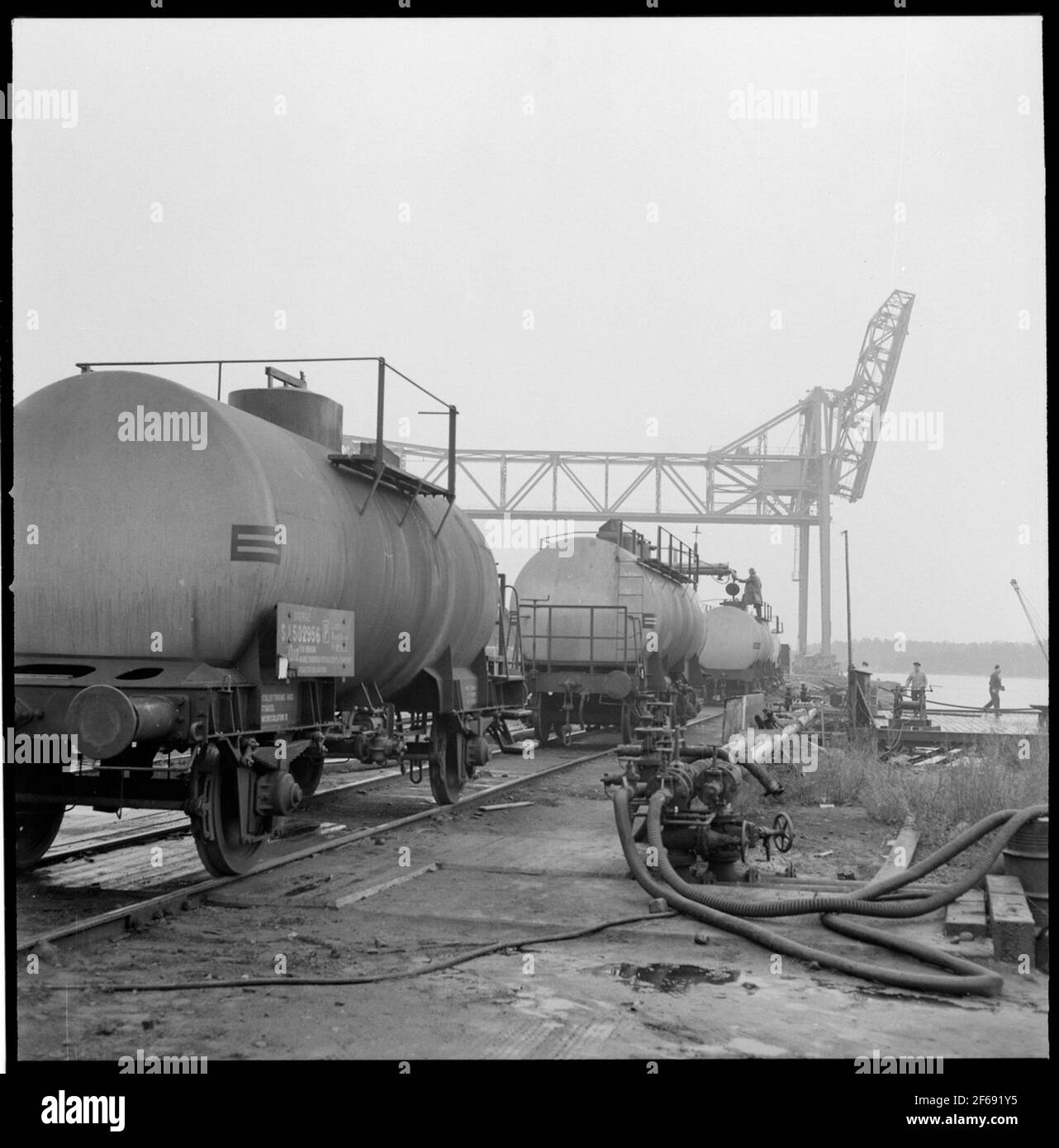 Oil fill in freight wagon tanks Stock Photo Alamy