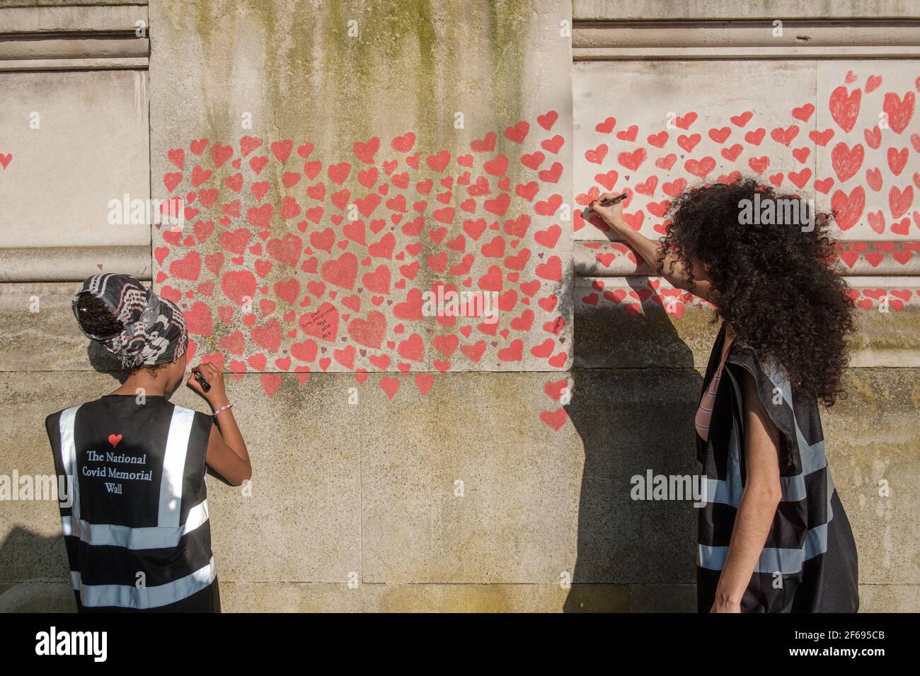 Day 2 of the National Covid Memorial Wall; More hearts have been added and more names have been included as a dedication to those who passed from Corona Stock Photo