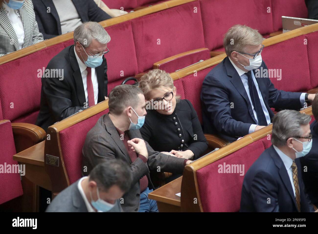 Non Exclusive: KYIV, UKRAINE - MARCH 30, 2021 - Batkivshchyna faction head, MP Yulia Tymoshenko (C) attends an extraordinary sitting of the Ukrainian Stock Photo