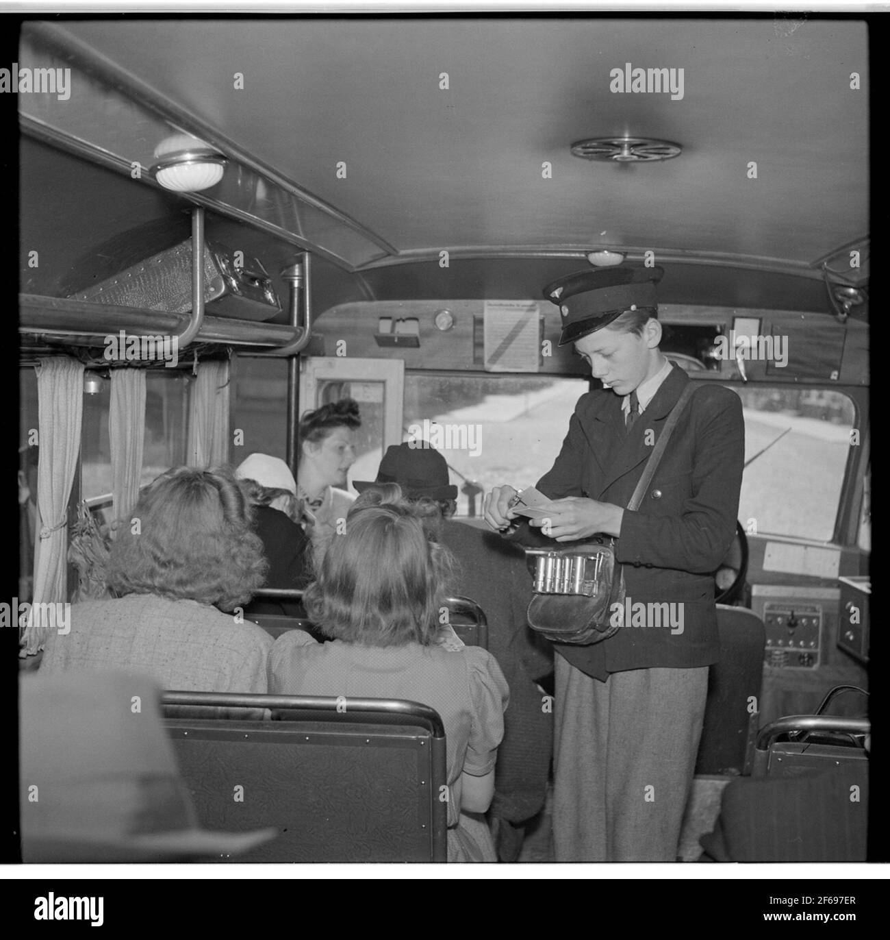 Ticket control on bus Stock Photo - Alamy