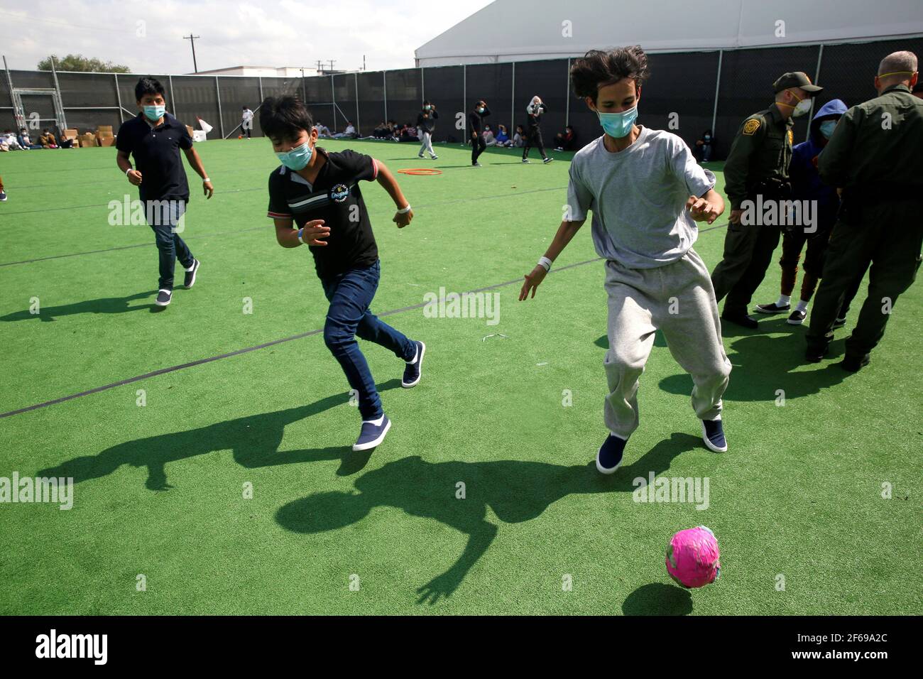 Migrant Children Play Soccer At A Small Field At The Donna Department Of Homeland Security Holding Facility The Main Detention Center For Unaccompanied Children In The Rio Grande Valley Run By The