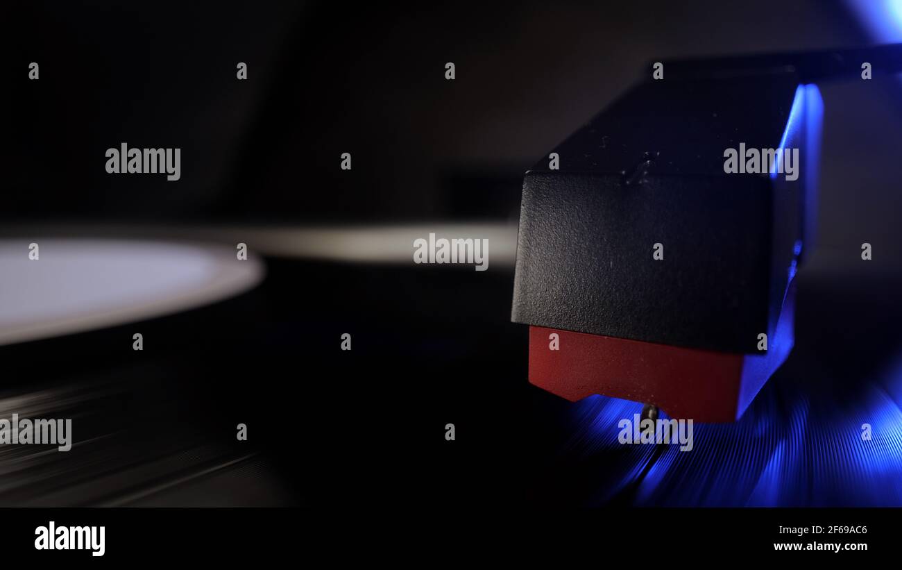Amazing view over a record player playing a vinyl Stock Photo - Alamy