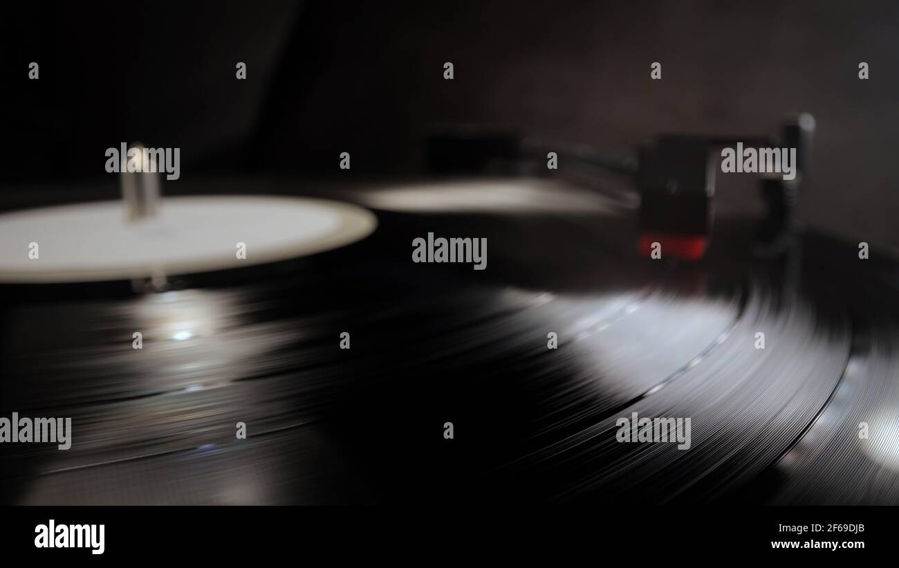 Record player in close-up - playing a vinyl Stock Photo - Alamy