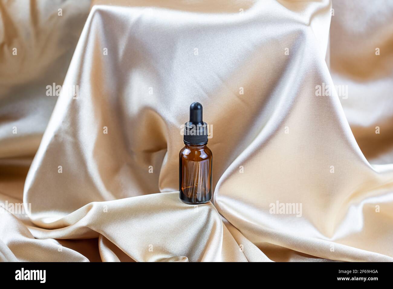 A bottle of perfume sitting on top of a table photo – Free Perfume