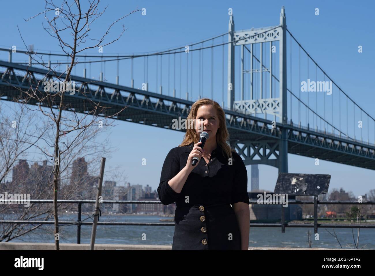 NEW YORK, NY - MARCH 30: Comedian Amy Schumer performs in Astoria Park as part of NY PopsUp on March 30, 2021 in Queens Borough of New York City. NY PopsUp is an ongoing festival with hundreds of pop-up performances around New York City that will continue through September 6, 2021. Credit: Ron Adar/Alamy Live News Stock Photo