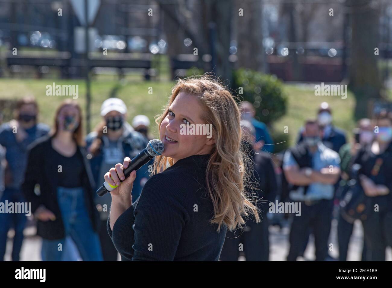 NEW YORK, NY - MARCH 30: Comedian Amy Schumer performs in Astoria Park as part of NY PopsUp on March 30, 2021 in Queens Borough of New York City. NY PopsUp is an ongoing festival with hundreds of pop-up performances around New York City that will continue through September 6, 2021. Credit: Ron Adar/Alamy Live News Stock Photo