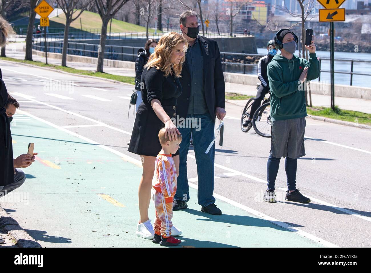 NEW YORK, NY - MARCH 30: Amy Schumer and son Gene Fischer in Astoria Park on March 30, 2021 in Queens Borough of New York City. Credit: Ron Adar/Alamy Live News Stock Photo