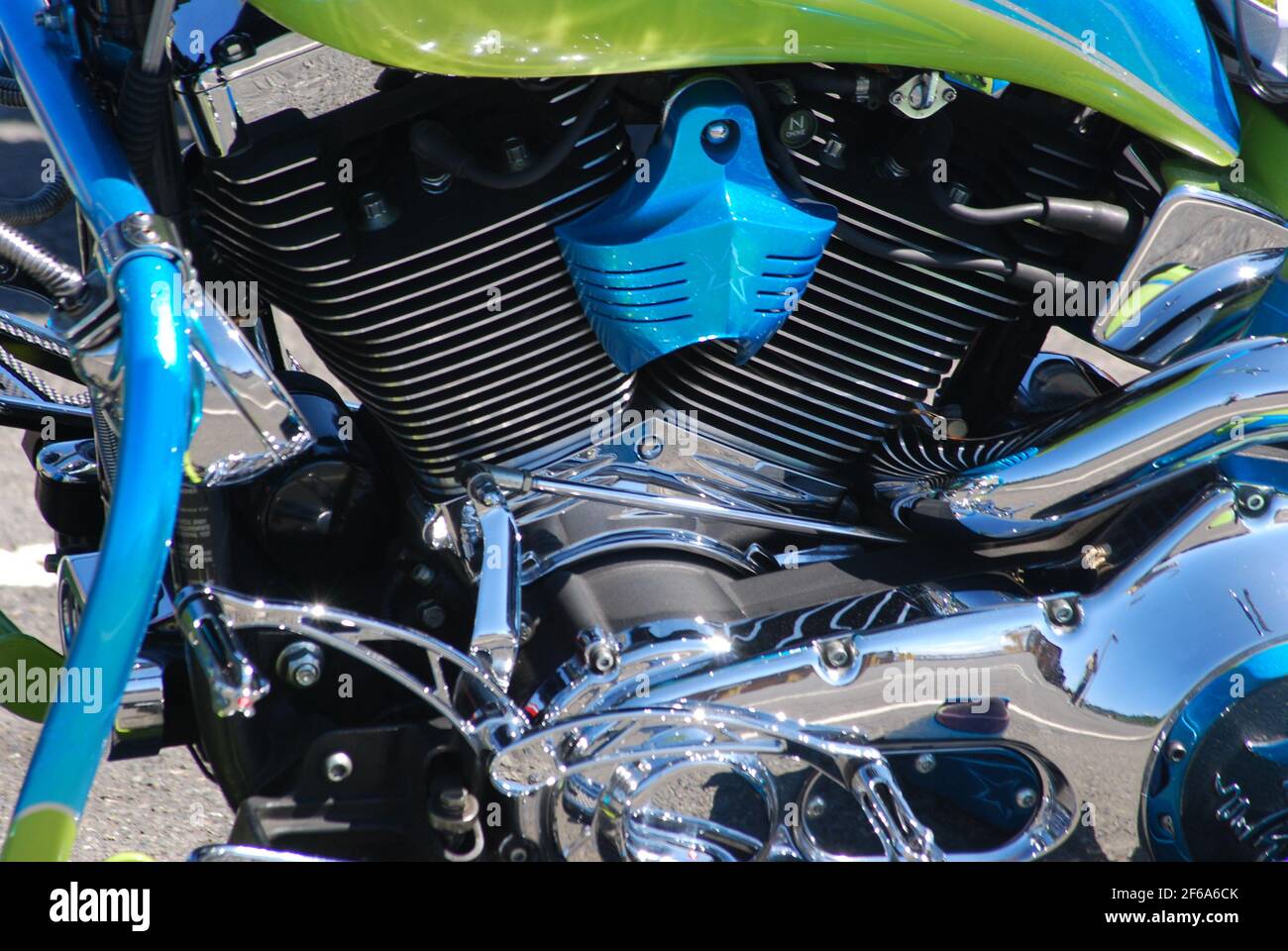 1998 customized motorcycle engine with blue accents. Stock Photo