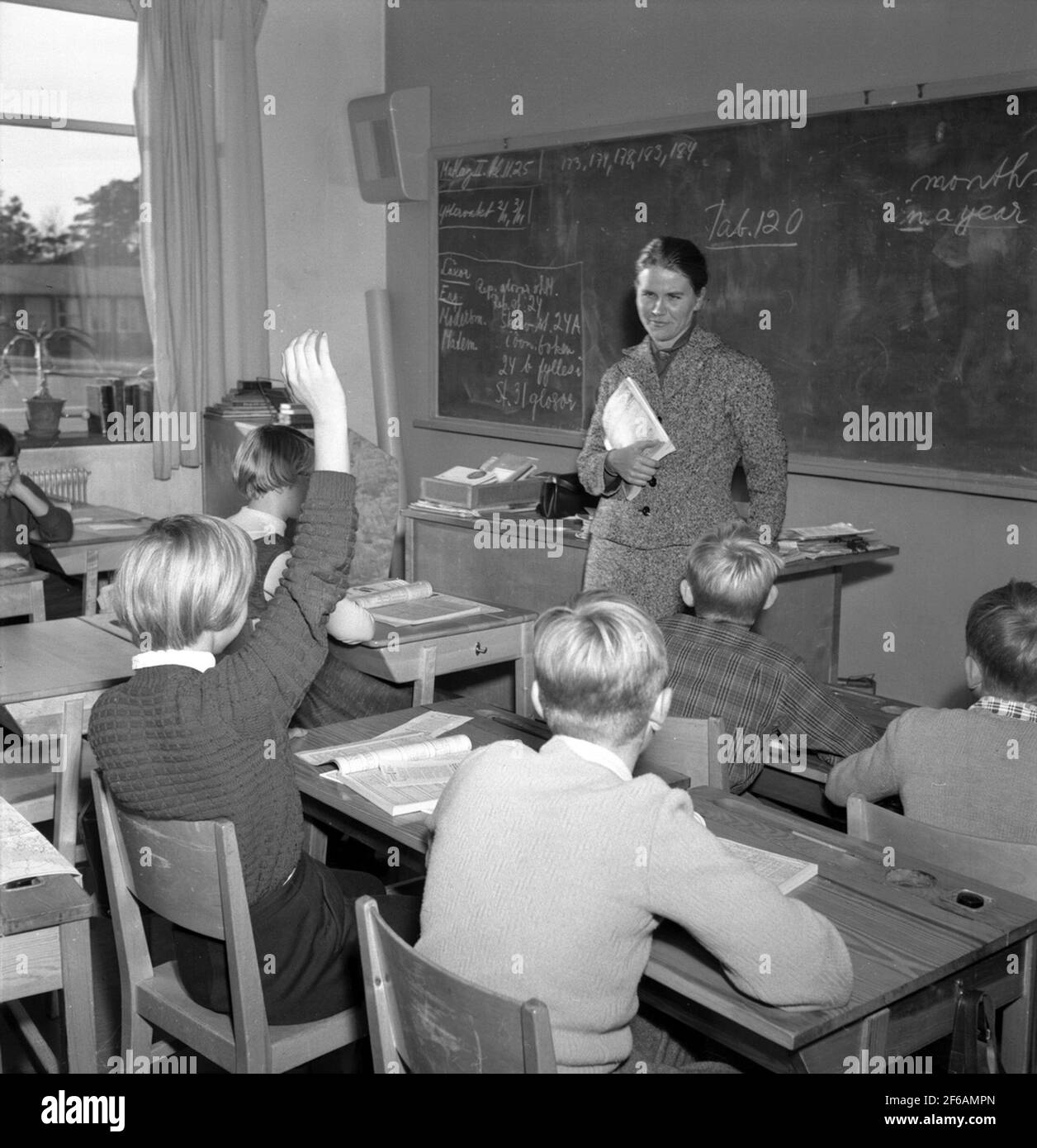 The children in school learn to read timetable Stock Photo Alamy