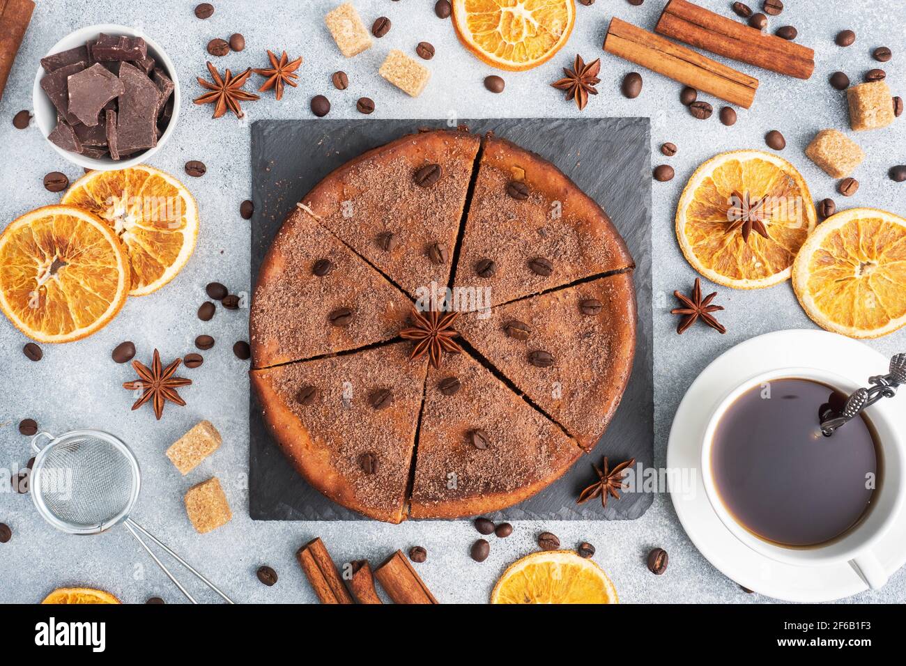 Chocolate curd casserole, whole pie on a stand, top view, copy space Stock Photo