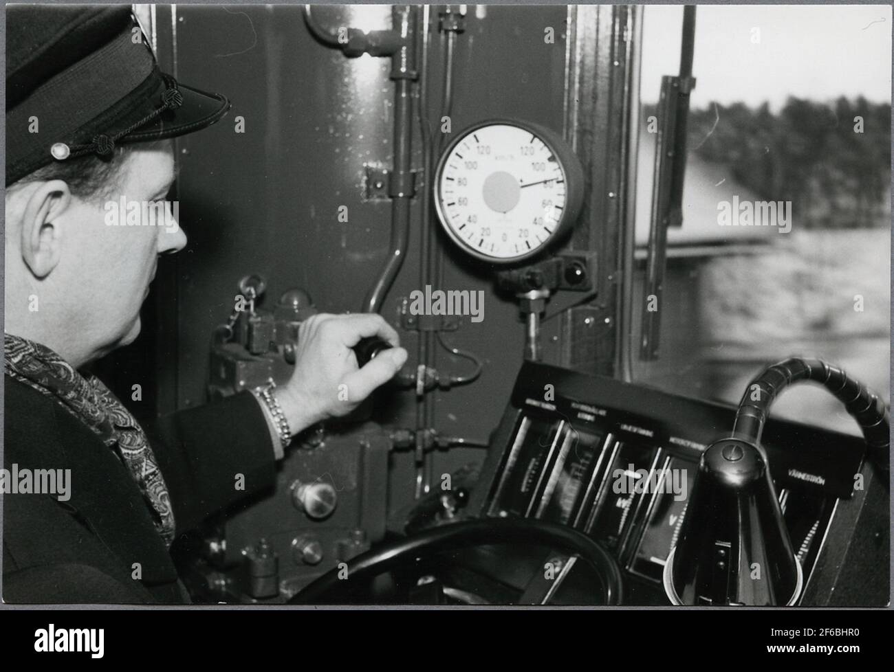 The train driver at the to the first electric train on the