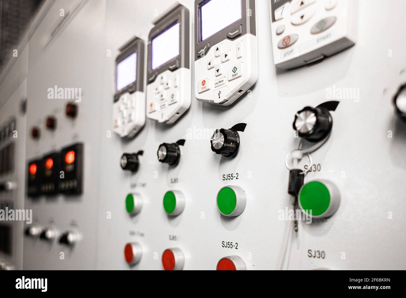 Many button of the machine in the factory Stock Photo - Alamy