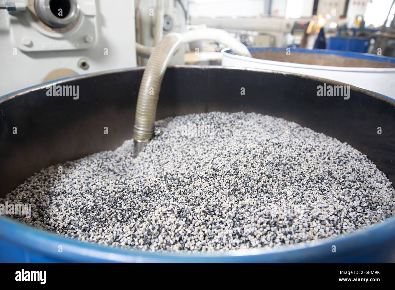 Open barrel full grain malt. White polypropylene bag. PP Stock Photo