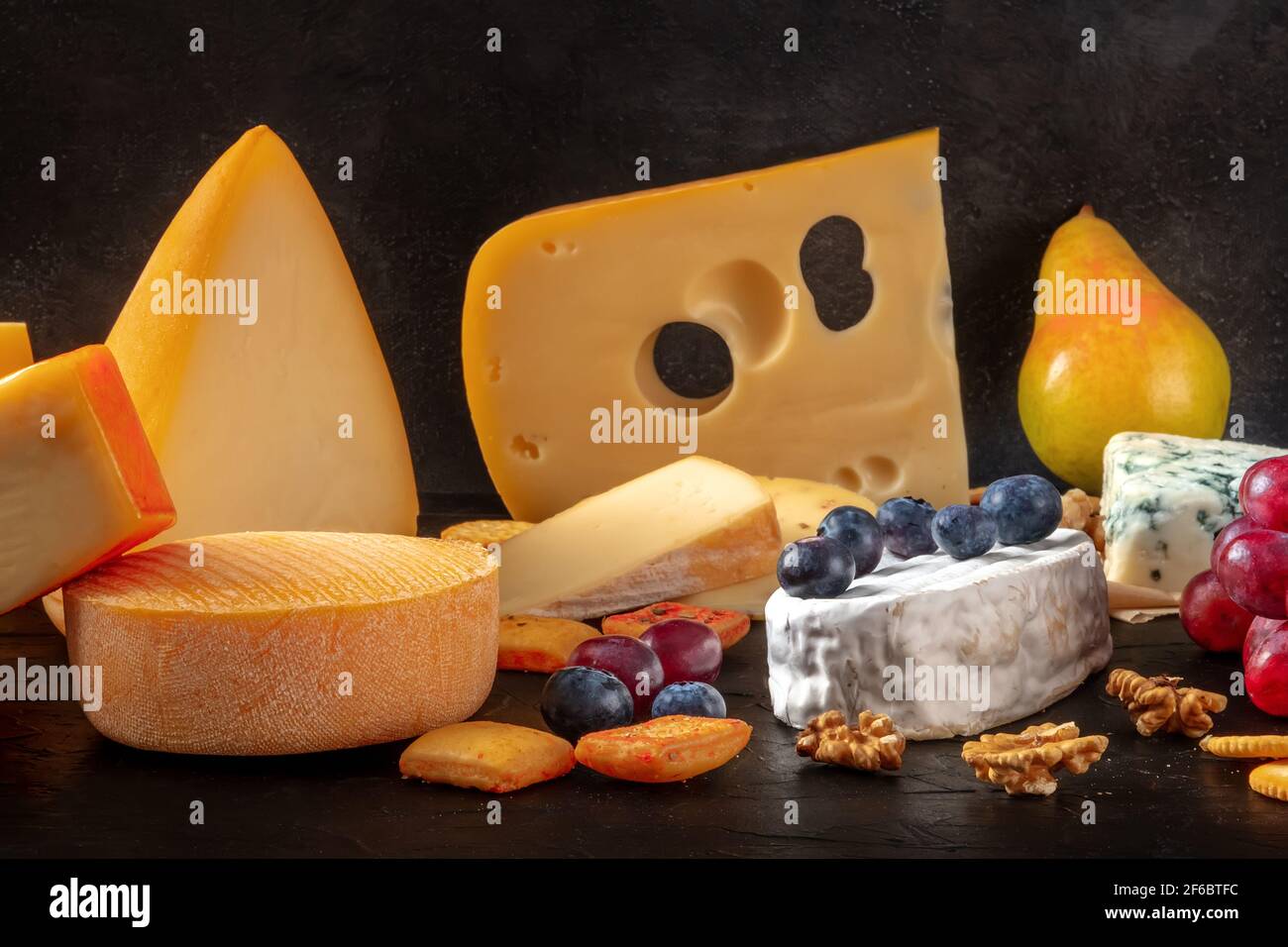 Cheese and fruit. A selection of european cheeses Stock Photo Alamy