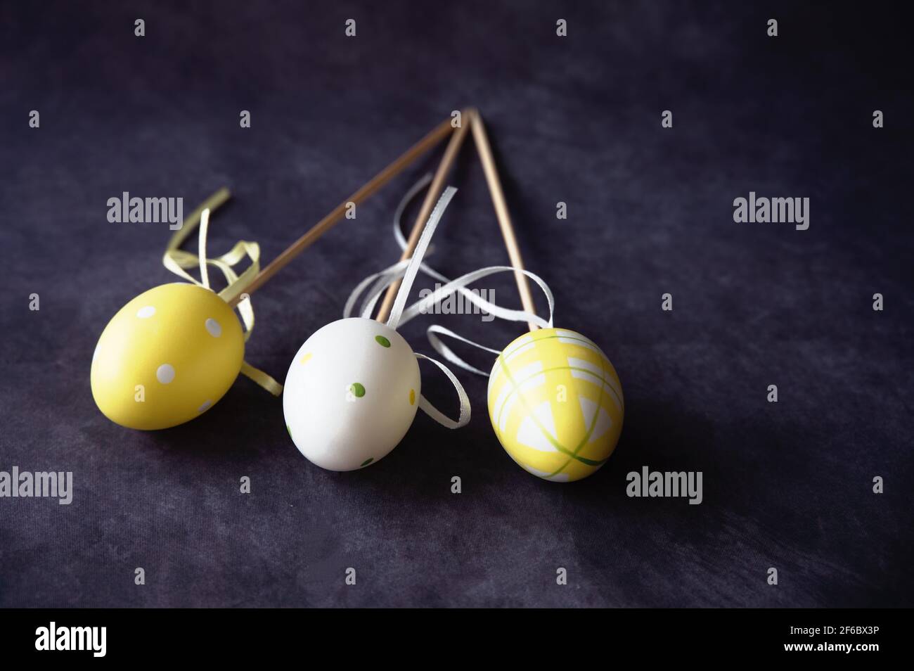 Colorful Easter eggs against black background Stock Photo