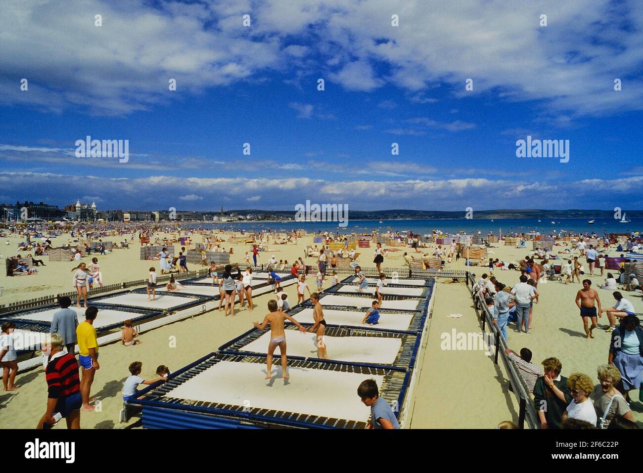 Kids beach trampolines, Weymouth, Dorset, England, UK Stock Photo Alamy