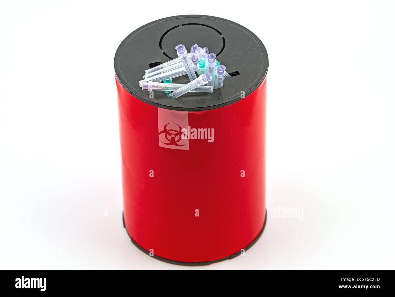 Many needle in red disposal boxes on white background Stock Photo Alamy