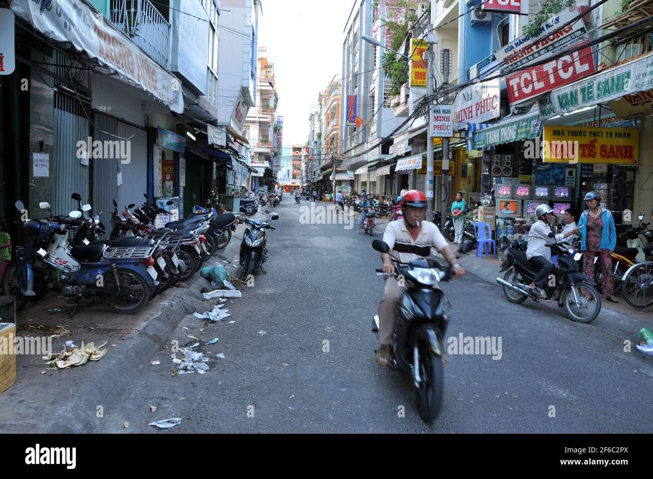 CAN THO, VIETNAM - FEBRUARY 17, 2013: Thousands of motorbikes and scooters in Can Tho, Vietnam. In the biggest city of the Mekong delta the traffic is Stock Photo