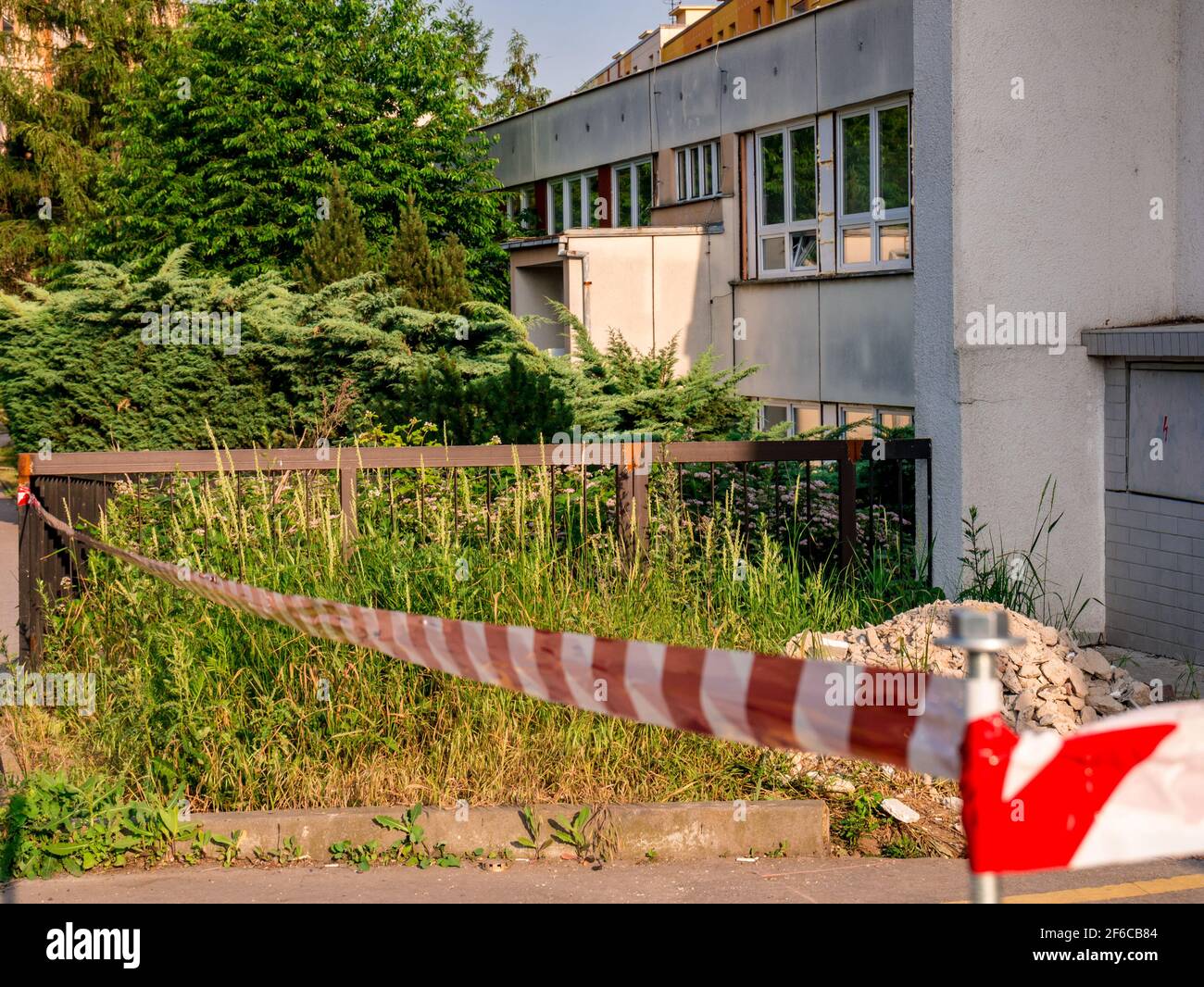 Rubble Border Tape with red stripes borders the workspace with a heap of rubble Stock ...