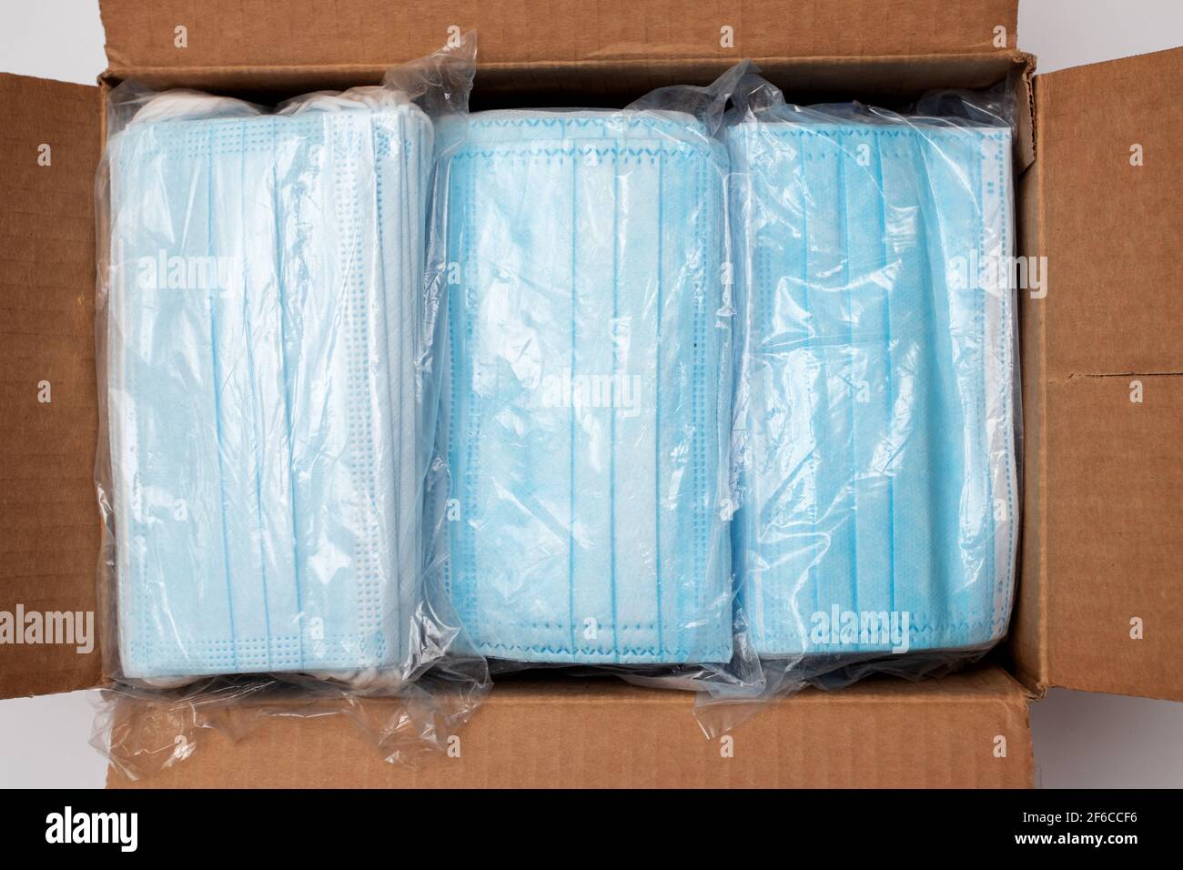 Closeup of disposable face masks pack in a box. Medical mask in the box