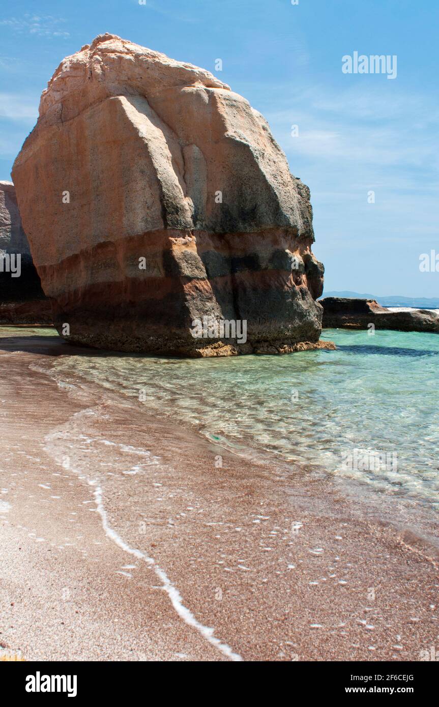 crystal clear water, white sand and colored rocks in Genio beach, Carloforte, St Pietro Island, Sardinia, Italy, Europe Stock Photo
