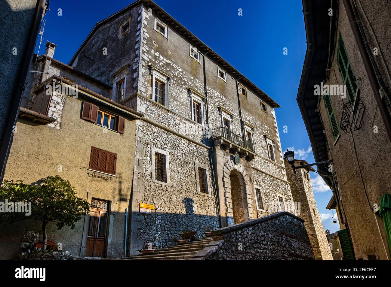 The small medieval village of Capranica Prenestina in Lazio, province of Rome. The imposing Palazzo Barberini, with the staircase and the large arched Stock Photo