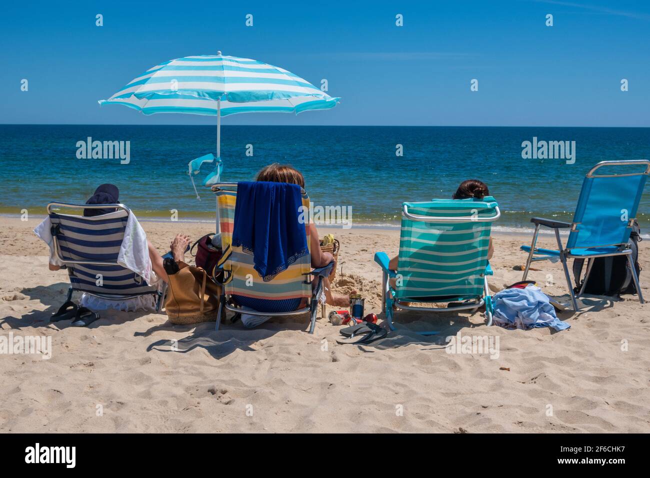 Relaxing on the beach at Tavira Island or Ilha de Tavira, Eastern Algave, Portugal Stock Photo