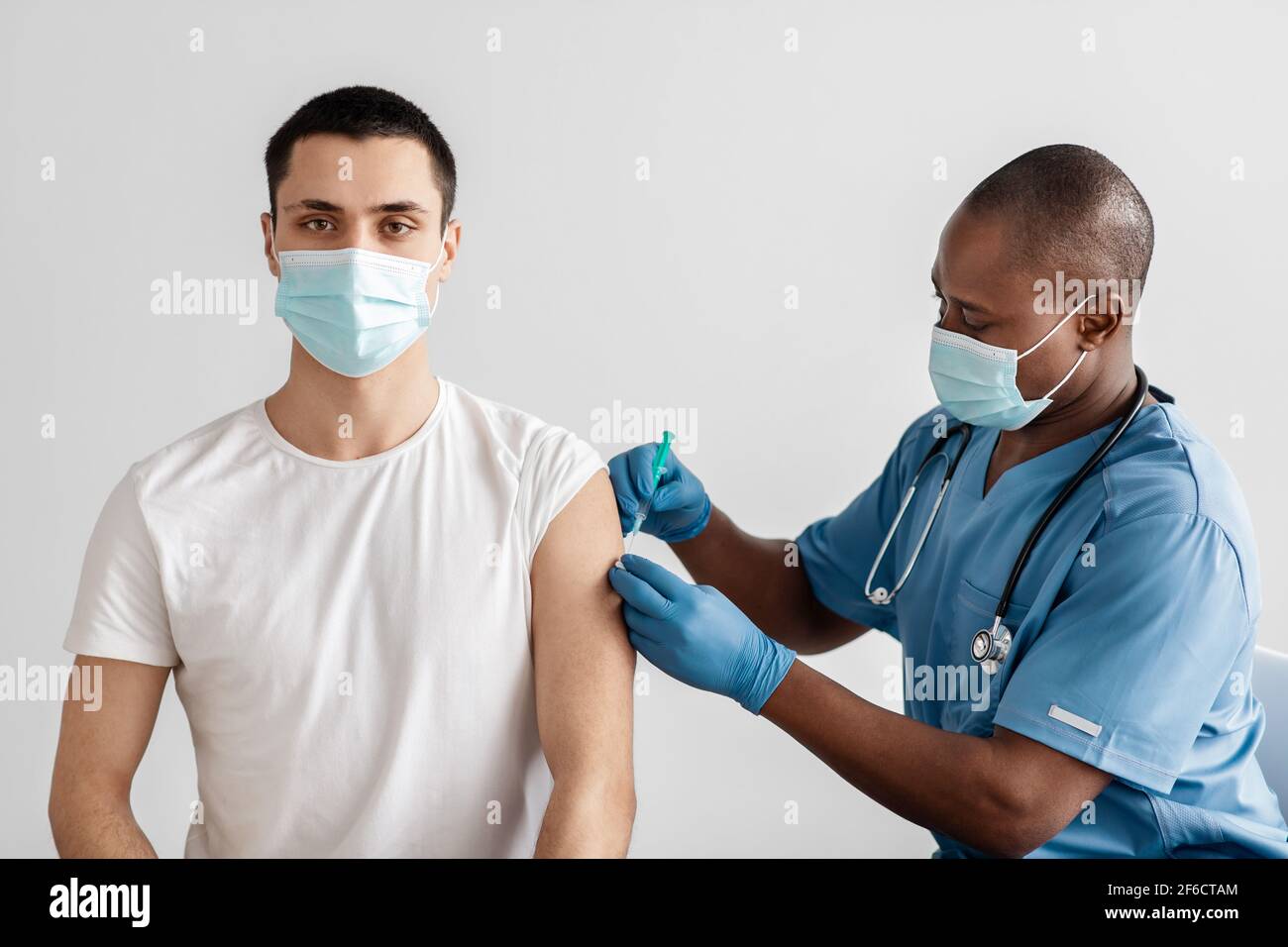 Antivirus program for population against covid-19 outbreak, vaccination campaign Stock Photo