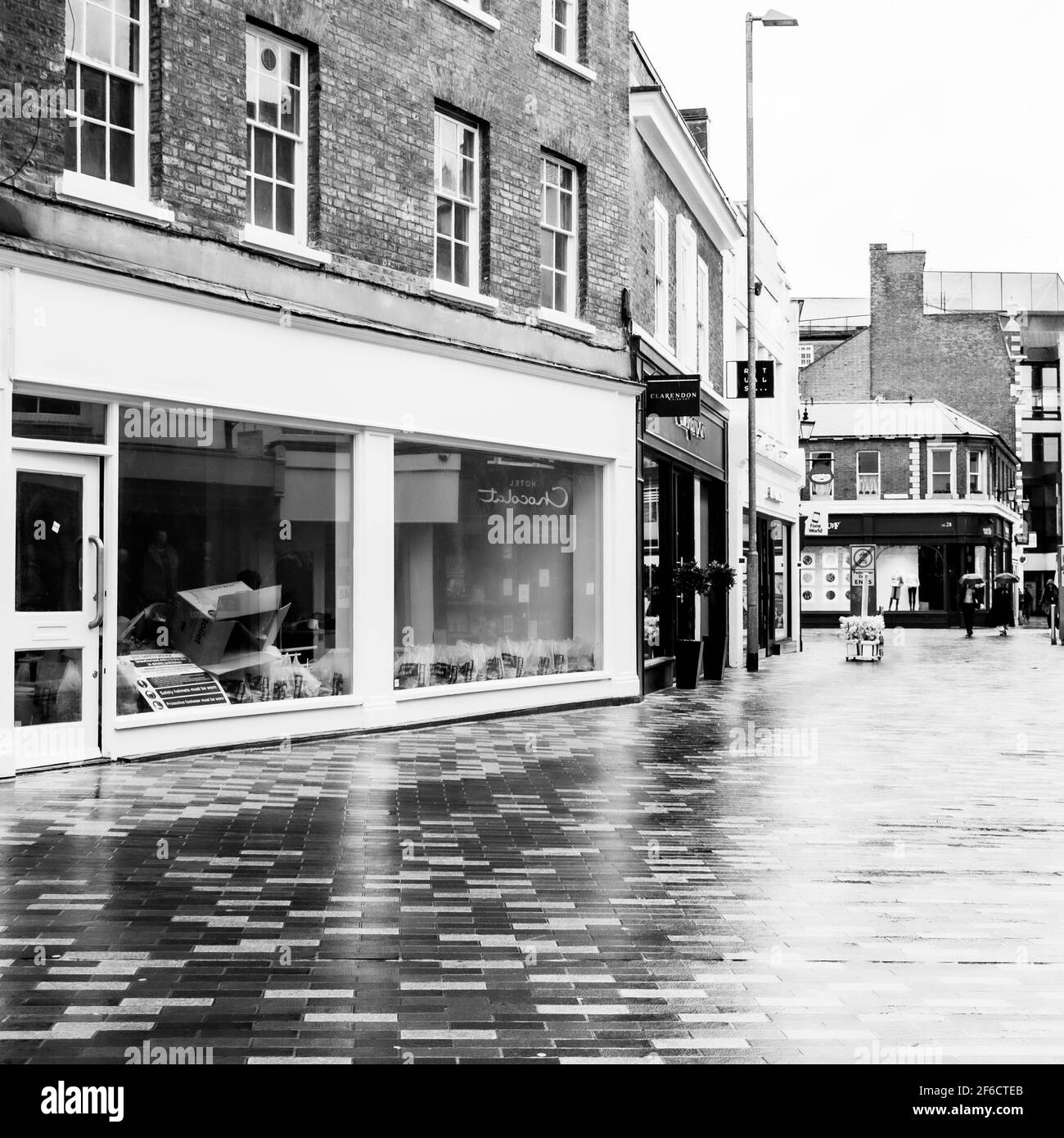 Black And White Image Of An Empty High Street Store CLosed Down During covid-19 Coronavirus Pandemic Lockdown Stock Photo