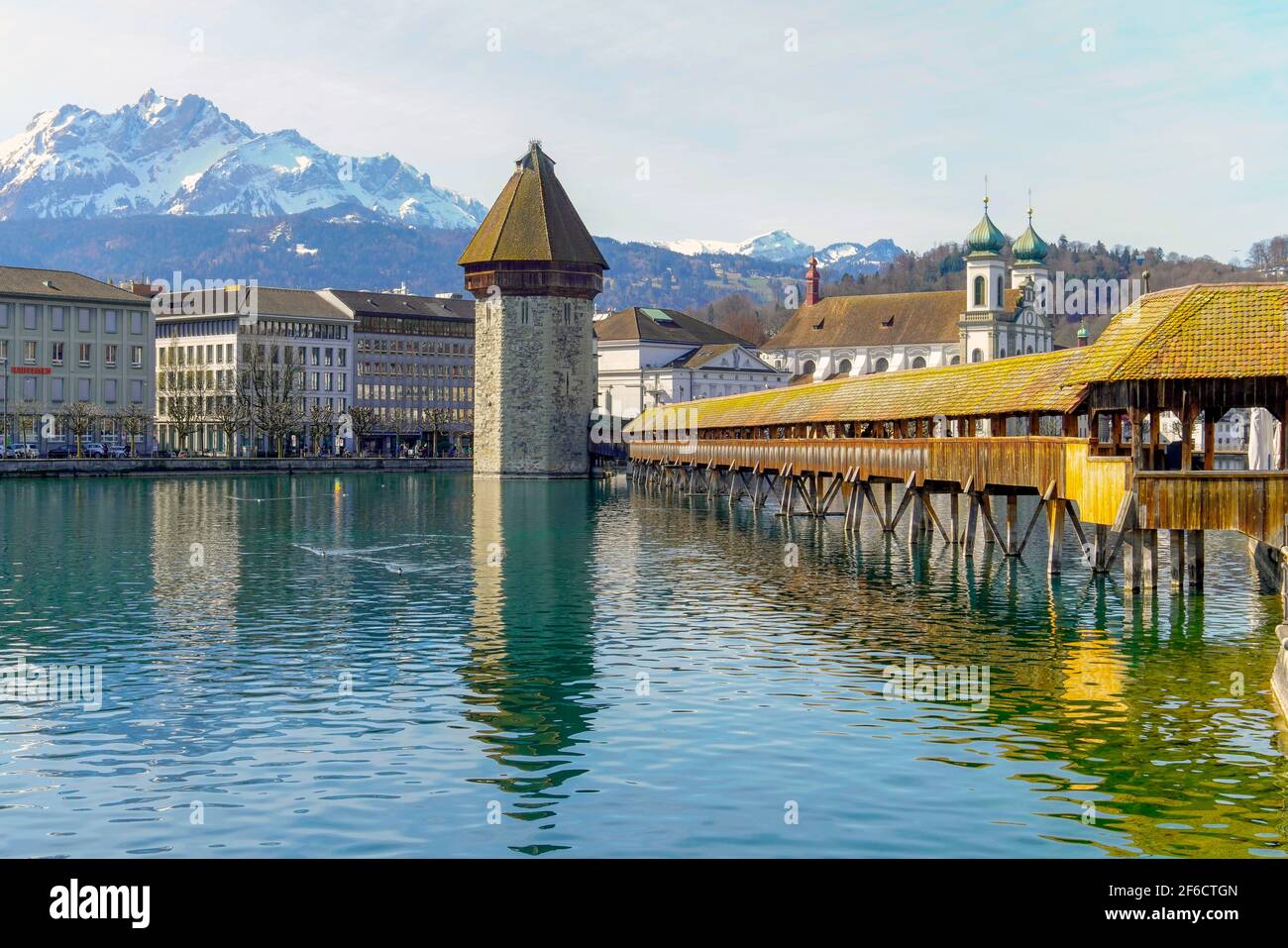 Panoramic view of Lucerne by river Reuss and Chapel Bridge (Kapellbrucke), wooden footbridge spanning the river diagonally, Canton Lucerne, Switzerlan Stock Photo