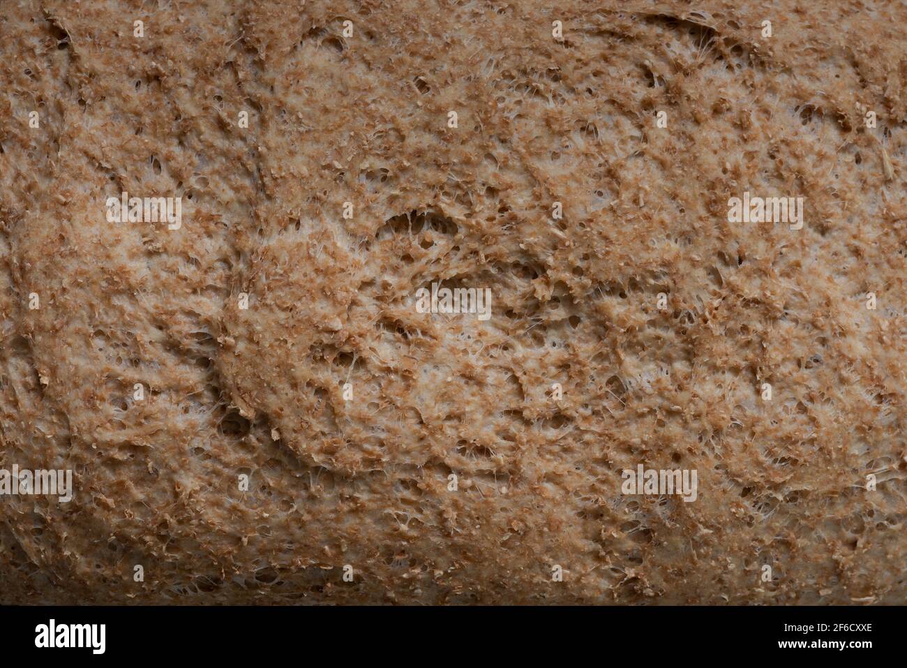 Wholemeal Bread Crust In Stages Of Being Hardened Browned By The wholemeal-bread-crust-in-stages-of-being-hardened-browned-by-the