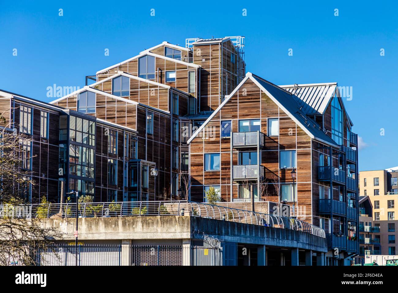 Residential building with timber cladding (Island House on Three Mills Lane) in Mill Meads, Newham, London, UK Stock Photo