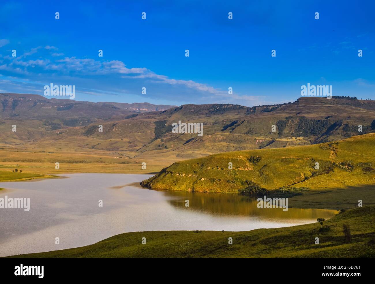 Drakensberg mountain escarpment and bell park dam around Cathkin peak Stock Photo