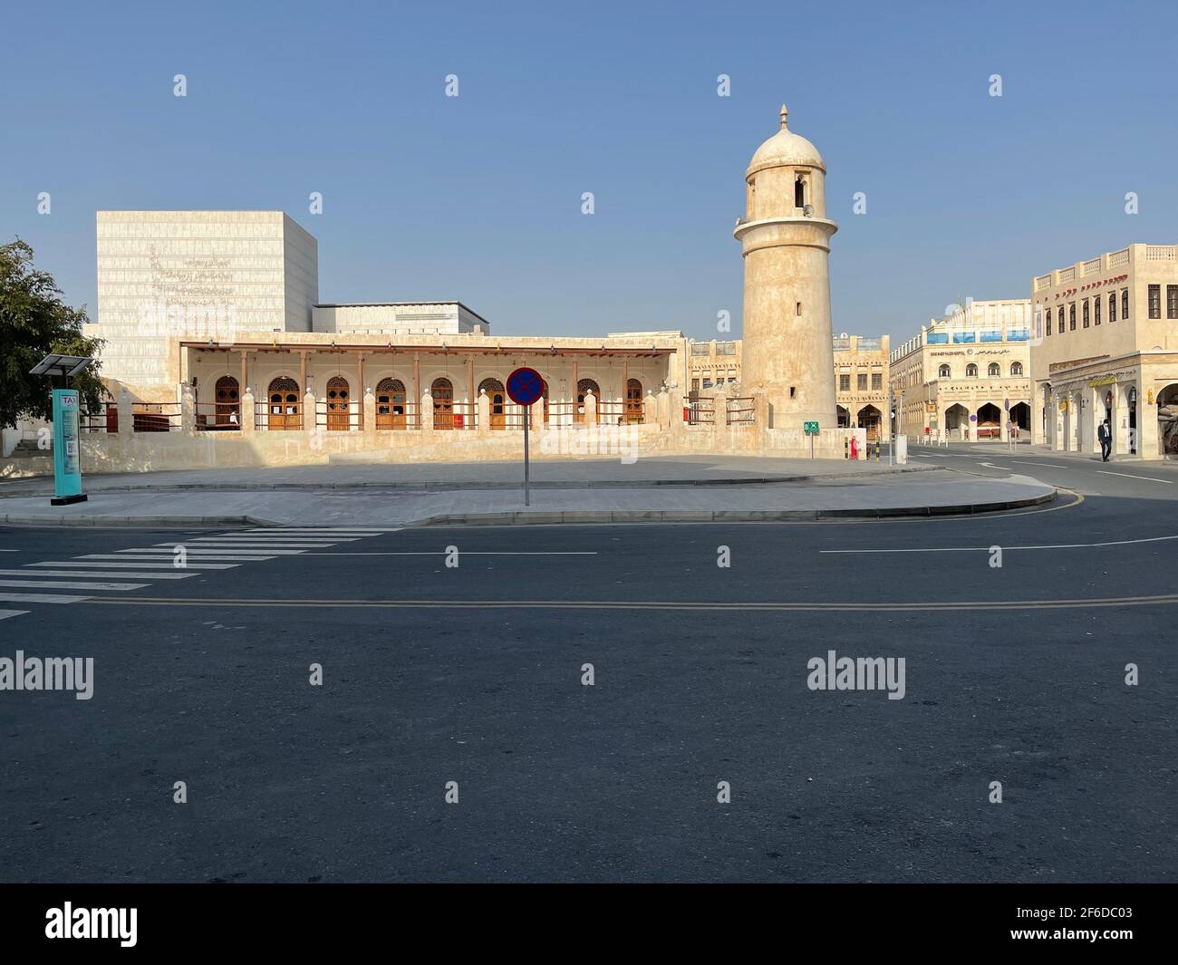 Al Ahmad Mosque, ancient mosque with its minaret in the heart of Souq Waqif, old traditional market in Doha center. Stock Photo