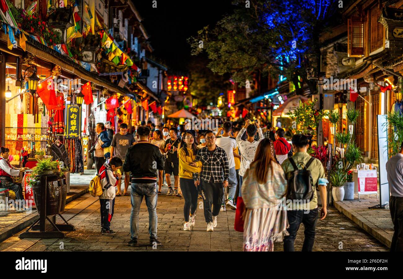 Dali China , 5 October 2020 : Dali old town road called foreigner street full of people at night in Dali Yunnan China Stock Photo