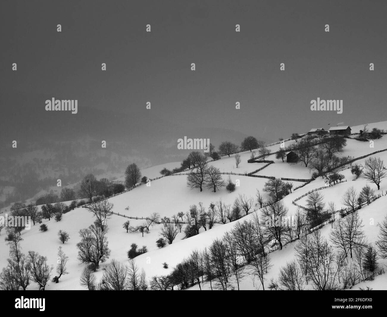 Black and white winter landscape of remote village Stock Photo