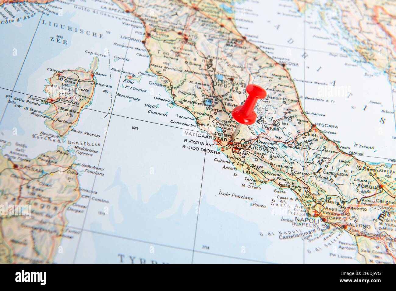 Red pin in a map of the Italy pointing out Vatican city as a concept for a desitnation one wishes to go to or has visted already Stock Photo