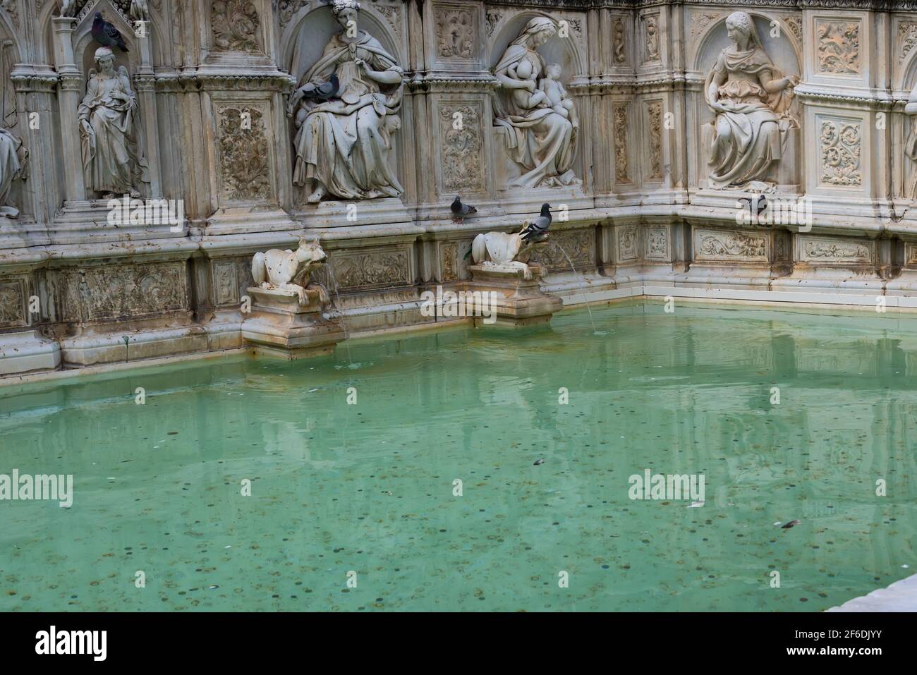 Detail of Fonte Gaia fountain of joy , with the Virgin Mary and baby Jesus. Piazza del Campo Campo square . Siena, Italy Stock Photo