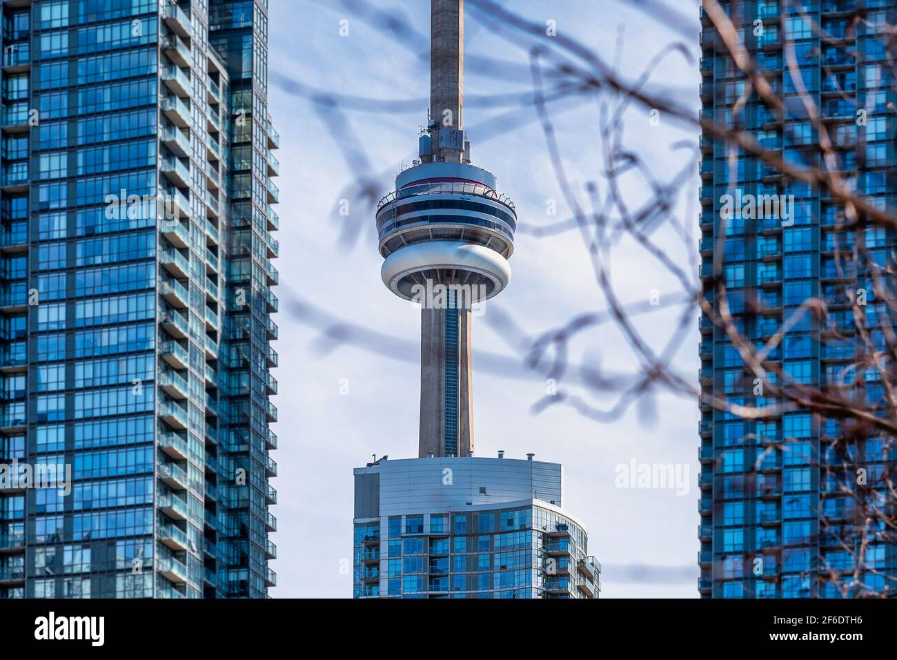 The CN Tower, a Canadian symbol and International Landmark, is seen from an unusual point of view Stock Photo