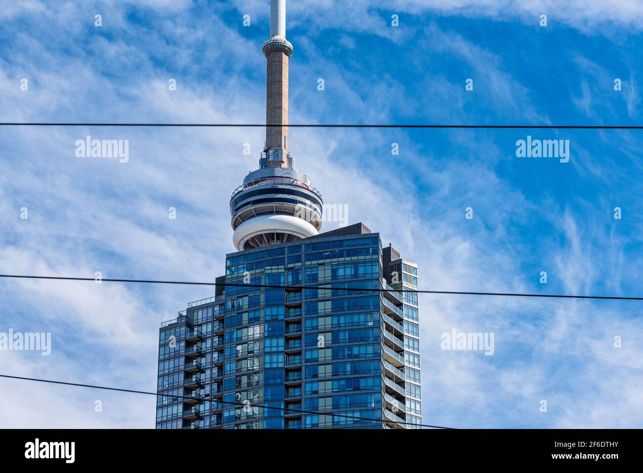 The CN Tower, a Canadian symbol and International Landmark, is seen from an unusual point of view Stock Photo