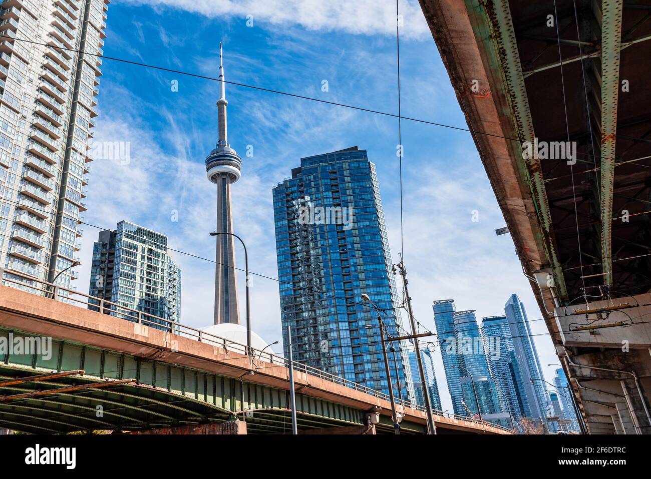 The CN Tower, a Canadian symbol and International Landmark, is seen from an unusual point of view Stock Photo