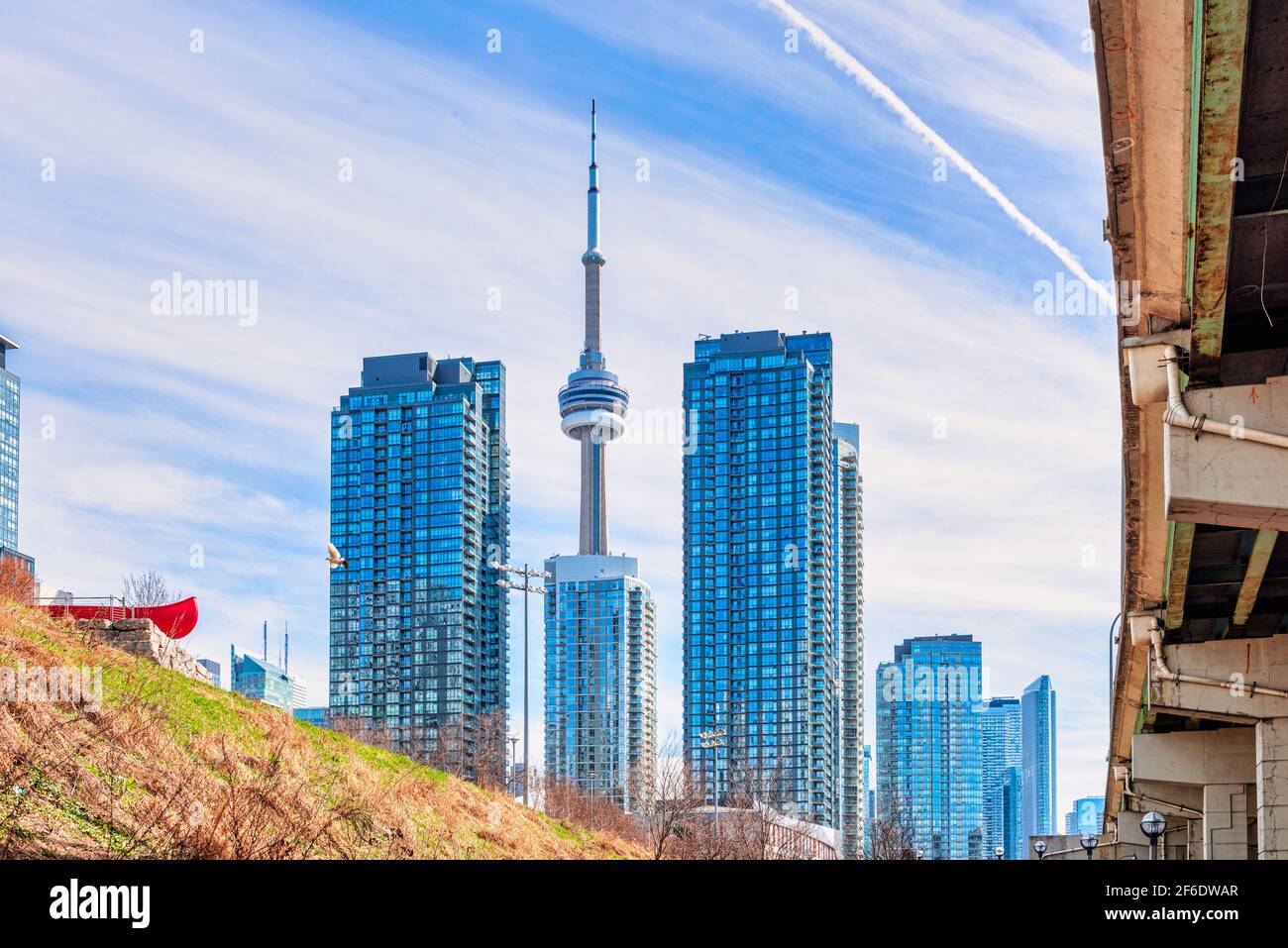 The CN Tower, a Canadian symbol and International Landmark, is seen from an unusual point of view Stock Photo